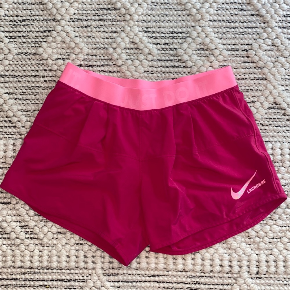 Pink Nike dry fit lacrosse shorts
